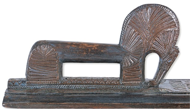 Detail of the handle of a mangle board from Denmark with an almost abstract horse, dated 1804